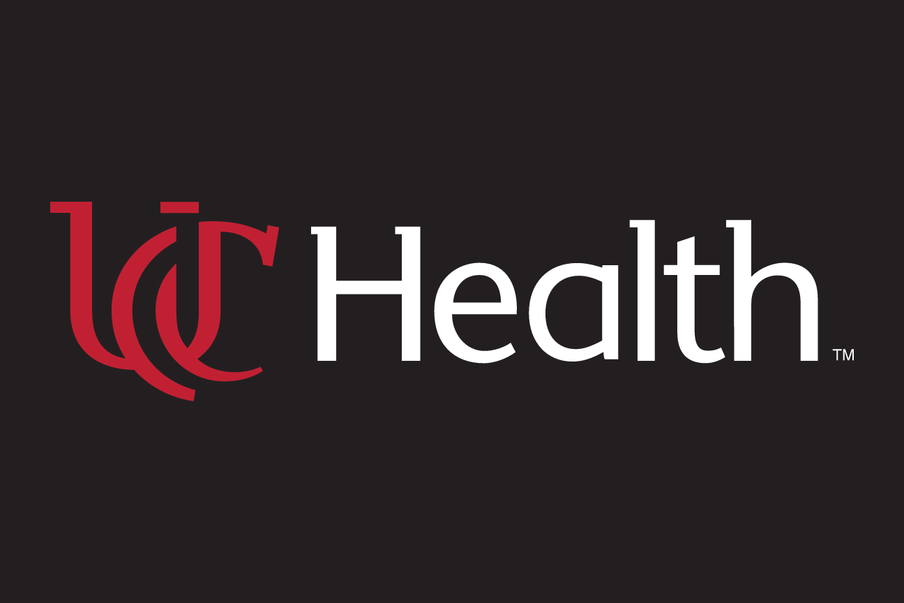 UC Health logo, red/white on black variant, cell 38