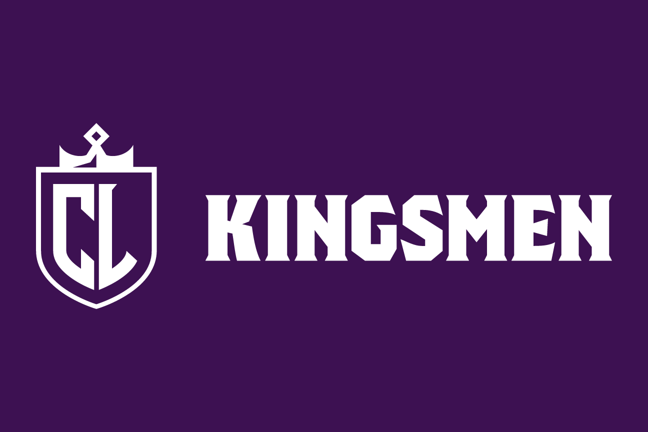 Kingsmen spirit mark, white on dark, horizontal variant, cell 99