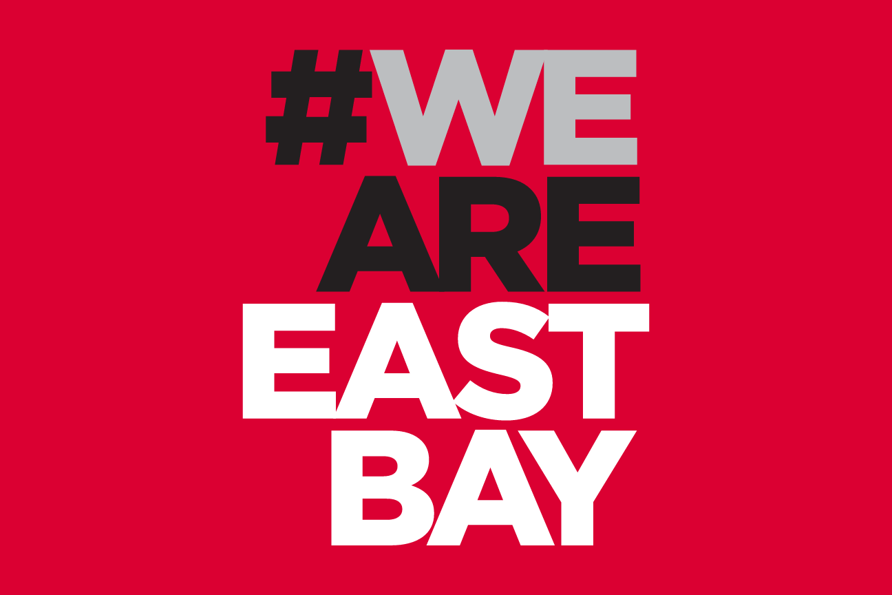 #WE ARE EAST BAY wordmark, stacked 4 lines, white on red variant, cell 76