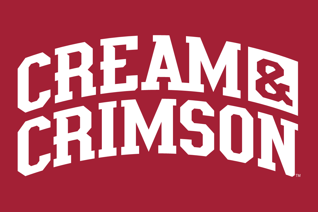CREAM & CRIMSON wordmark, arched white on crimson variant, cell 40