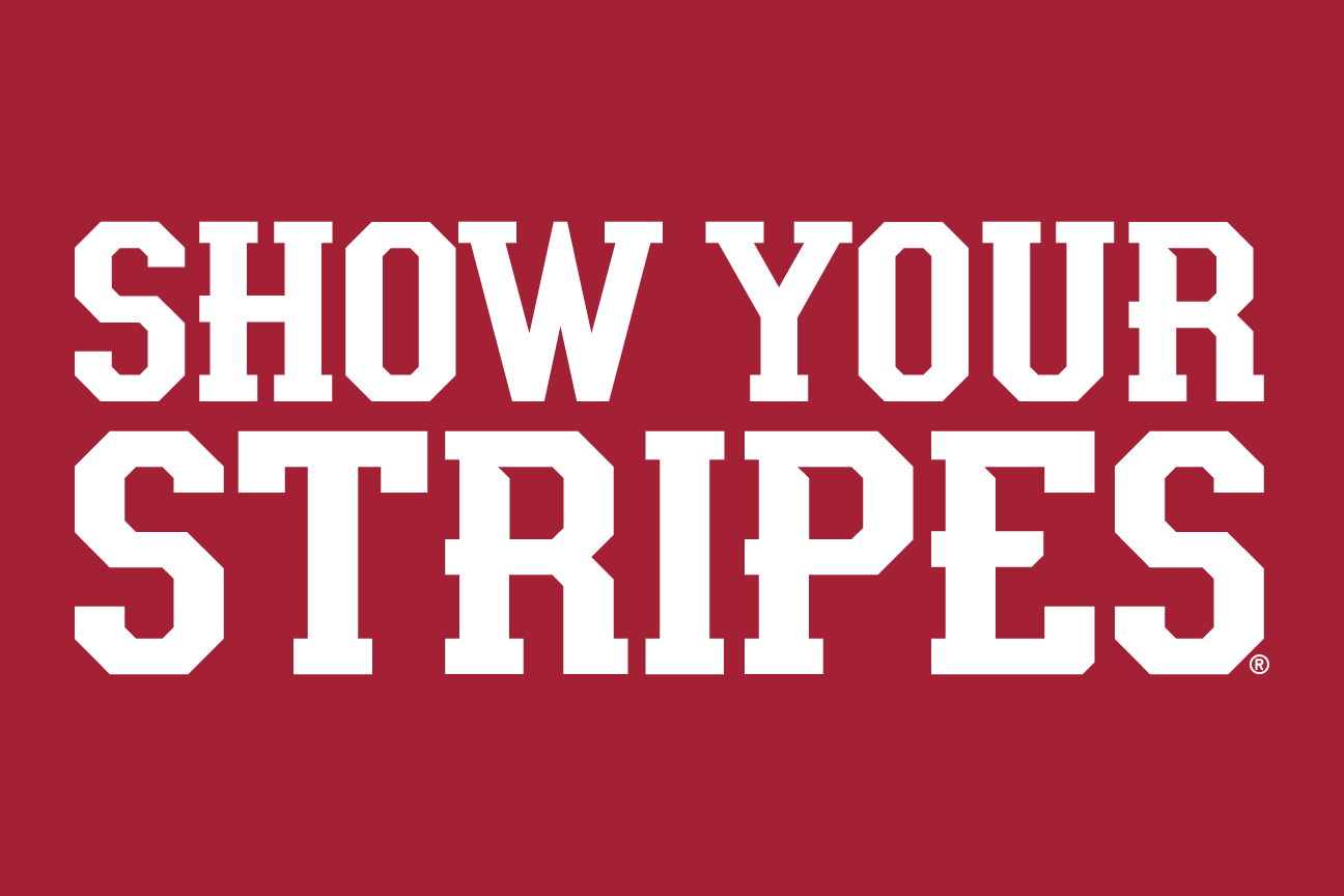 SHOW YOUR STRIPES wordmark, arched white outline on crimson variant, cell 50