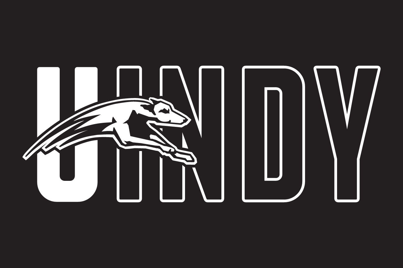 UINDY wordmark with greyhound, white outline on black variant, cell 16