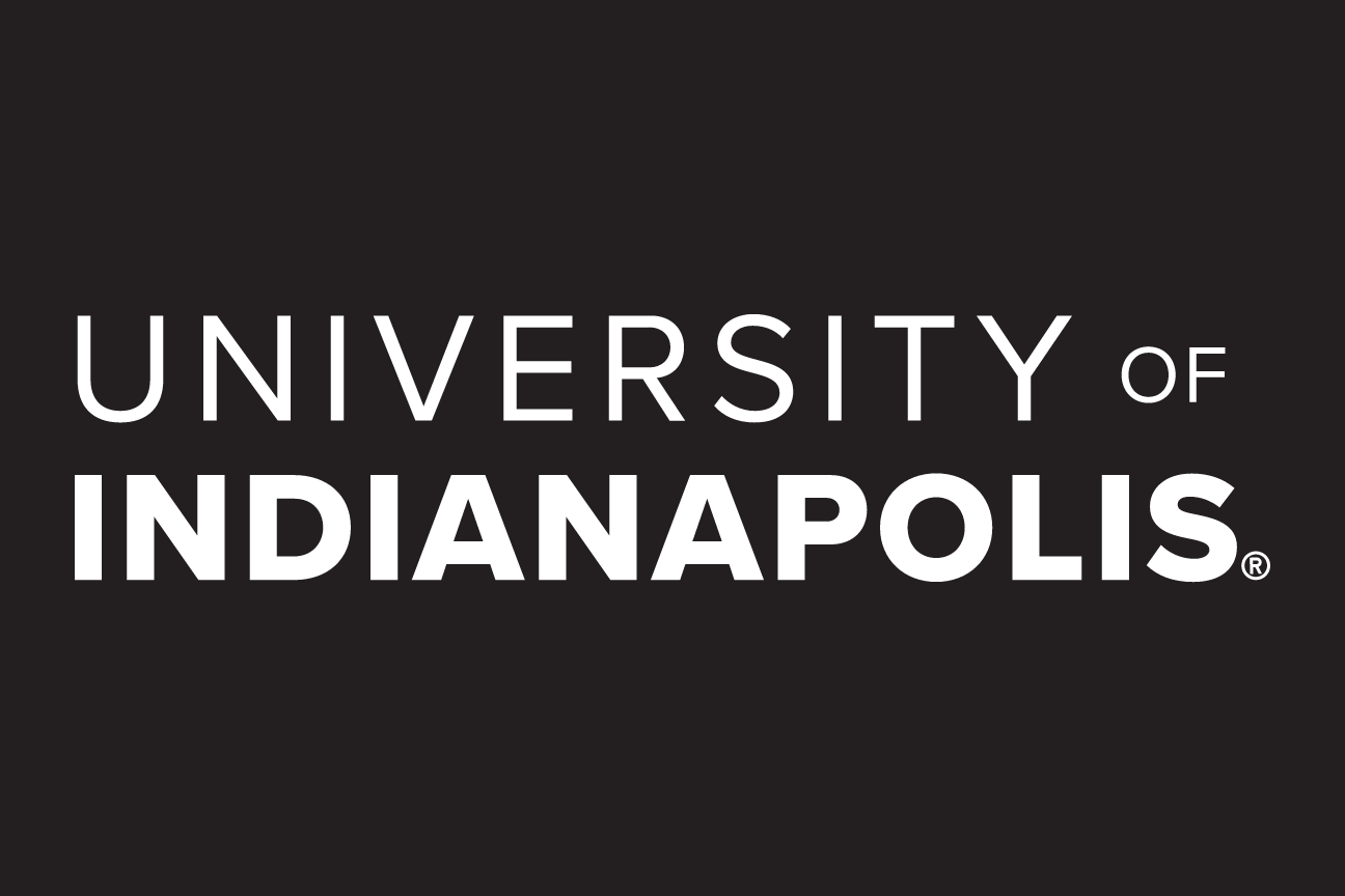 University of Indianapolis stacked wordmark, white on black variant, cell 19