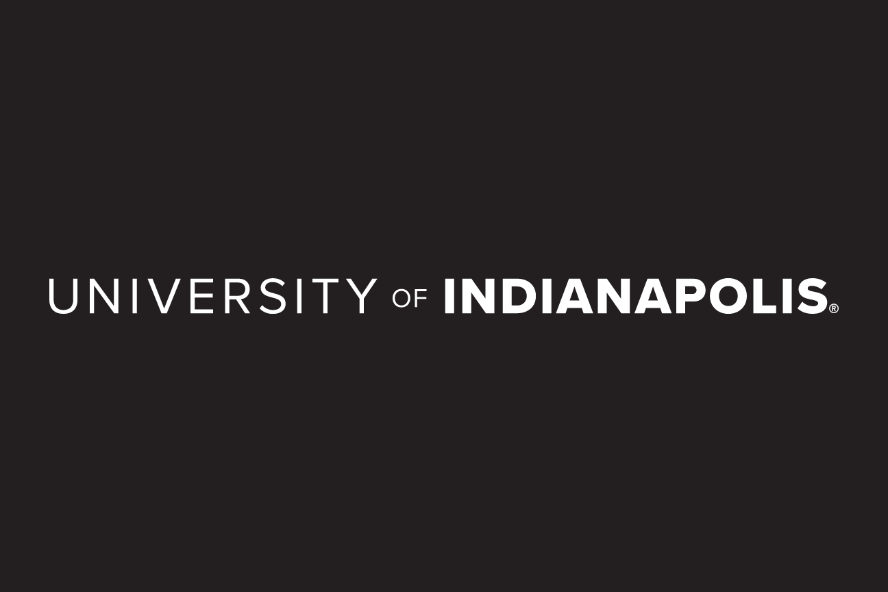 University of Indianapolis horizontal wordmark, white on black variant, cell 22