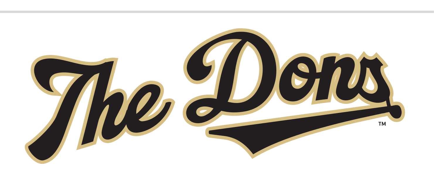 The Dons script, gold with black outline variant, cell 120