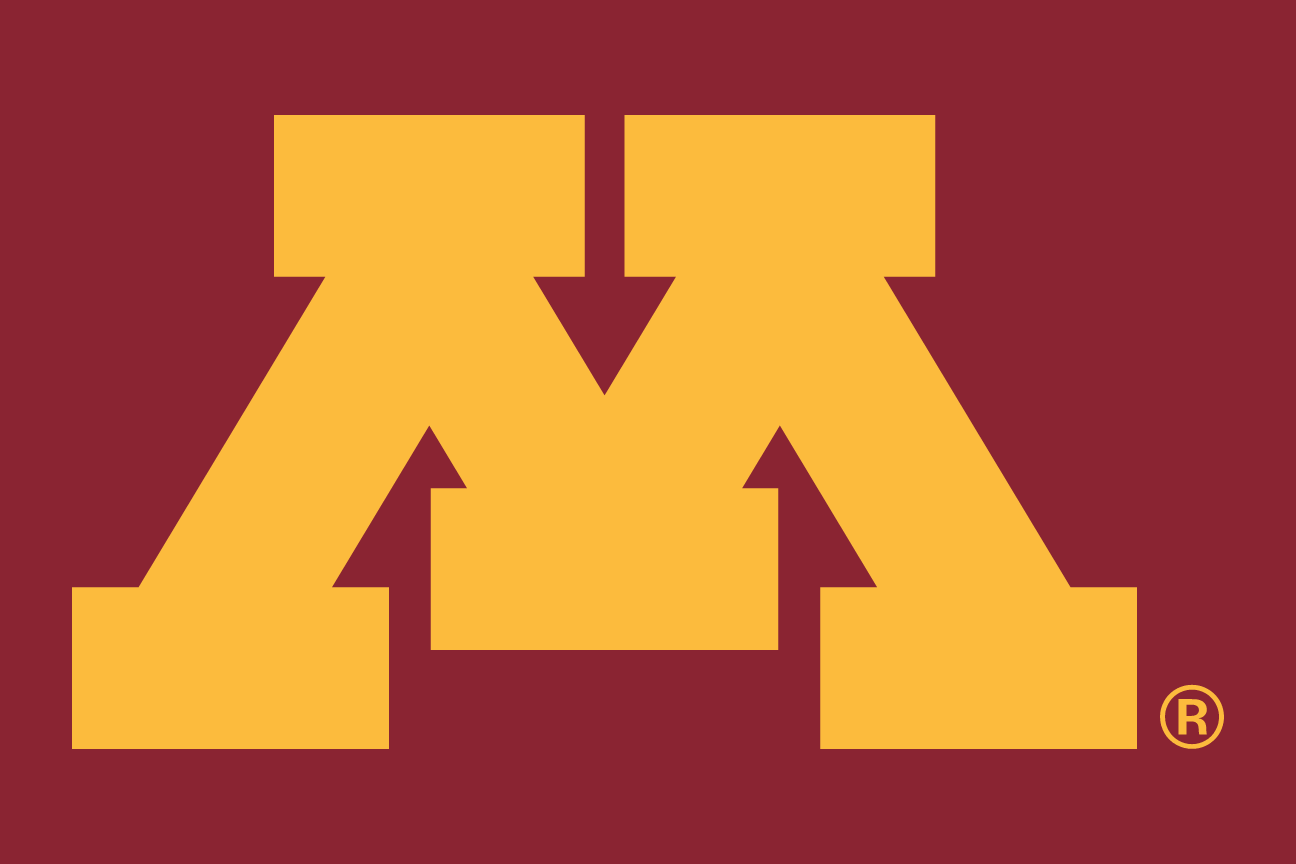 Institutional Block M, solid gold on maroon background variant, cell 10