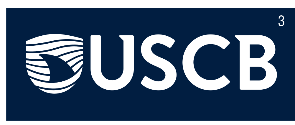 USCB logo with shark fin, reverse color variant, cell 33
