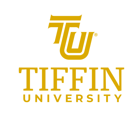 TIFFIN UNIVERSITY stacked lockup, gold/black variant, cell 10